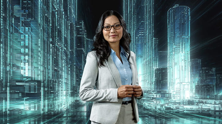 A business woman standing infront of a digital landscape