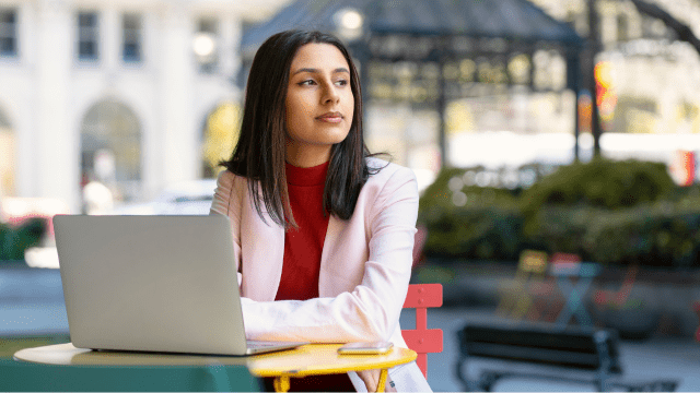 Woman outside looking pensive