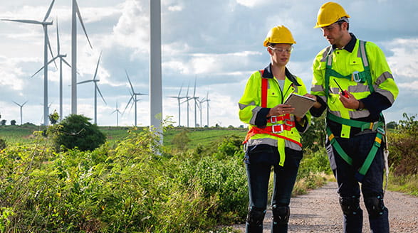 Two people on wind farm