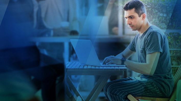 Man sitting at a table wearing casual clothes