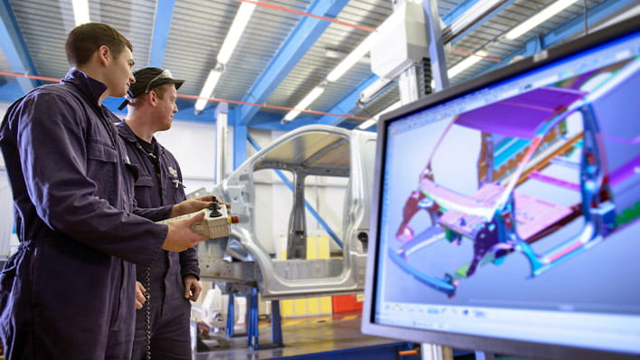 Two men in manufacturing plant