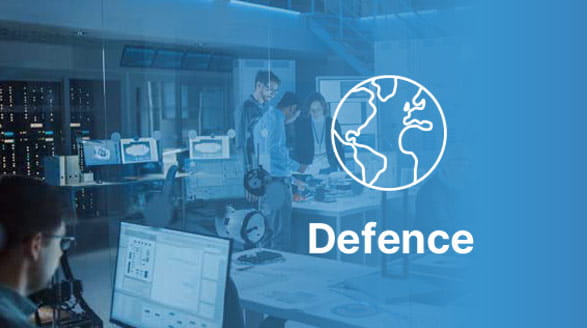 People working on computers in office